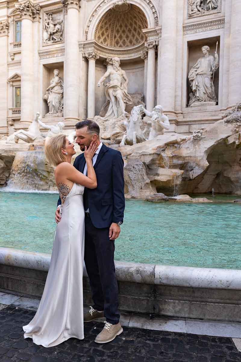 Roman nuptial documentation Trevi fountain early morning 