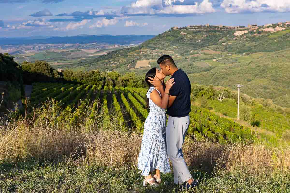 Engagement photography session taken on a Tuscan hill in Montalcino Italy. Proposing photoshoot