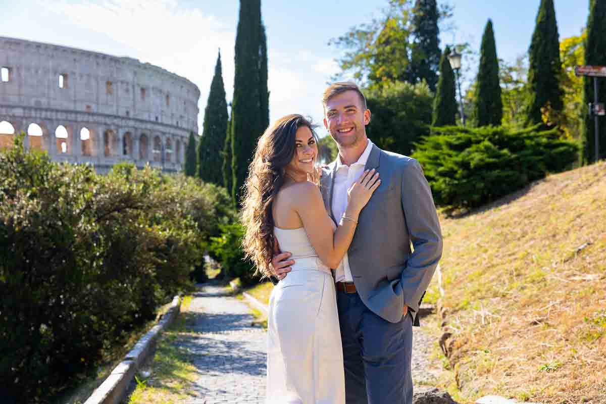 Couple portrait taken in front of the Roman Coliseum