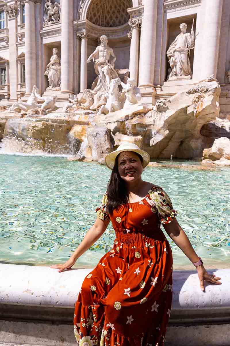 Mom solo portrait at the Trevi fountain