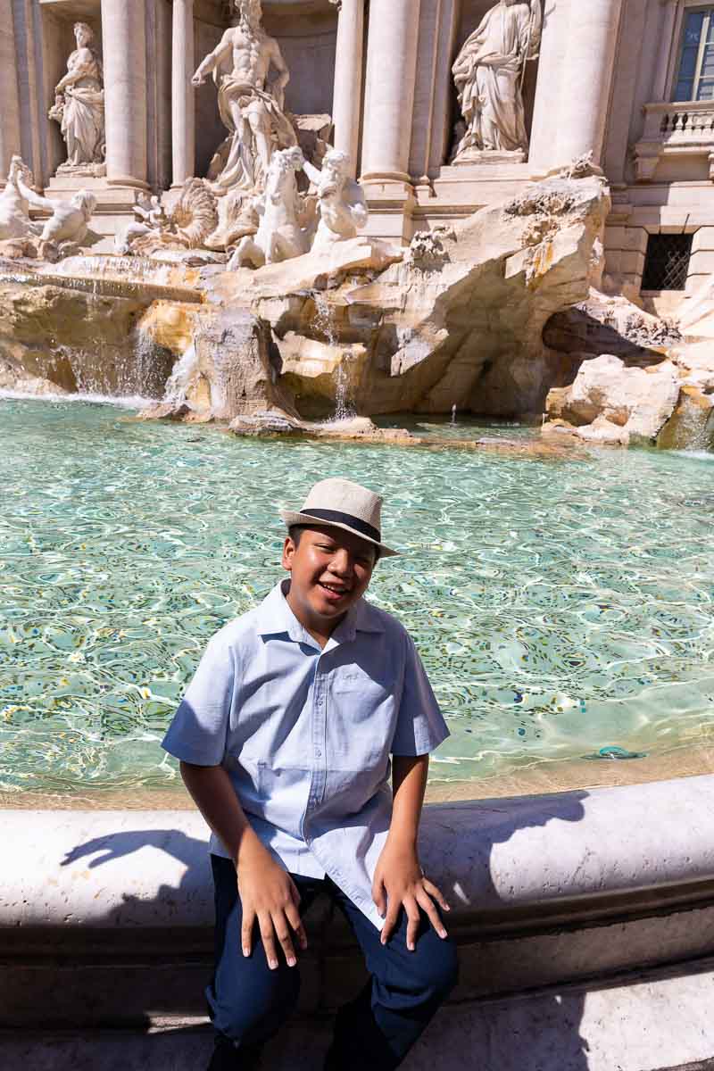 Son solo shot photographed while sitting on the edge of the Trevi fountain