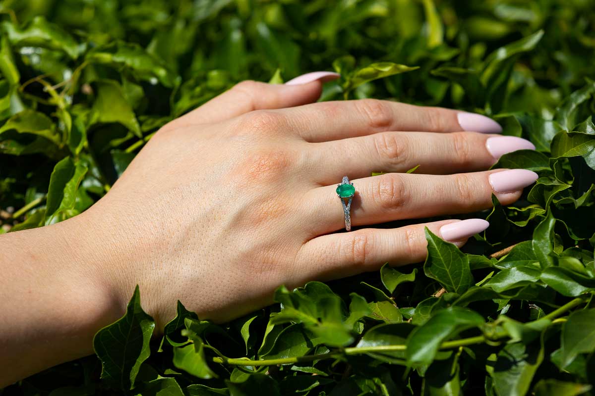 Close up image of the engagement ring photographed over greenery Engagement Proposal in Rome