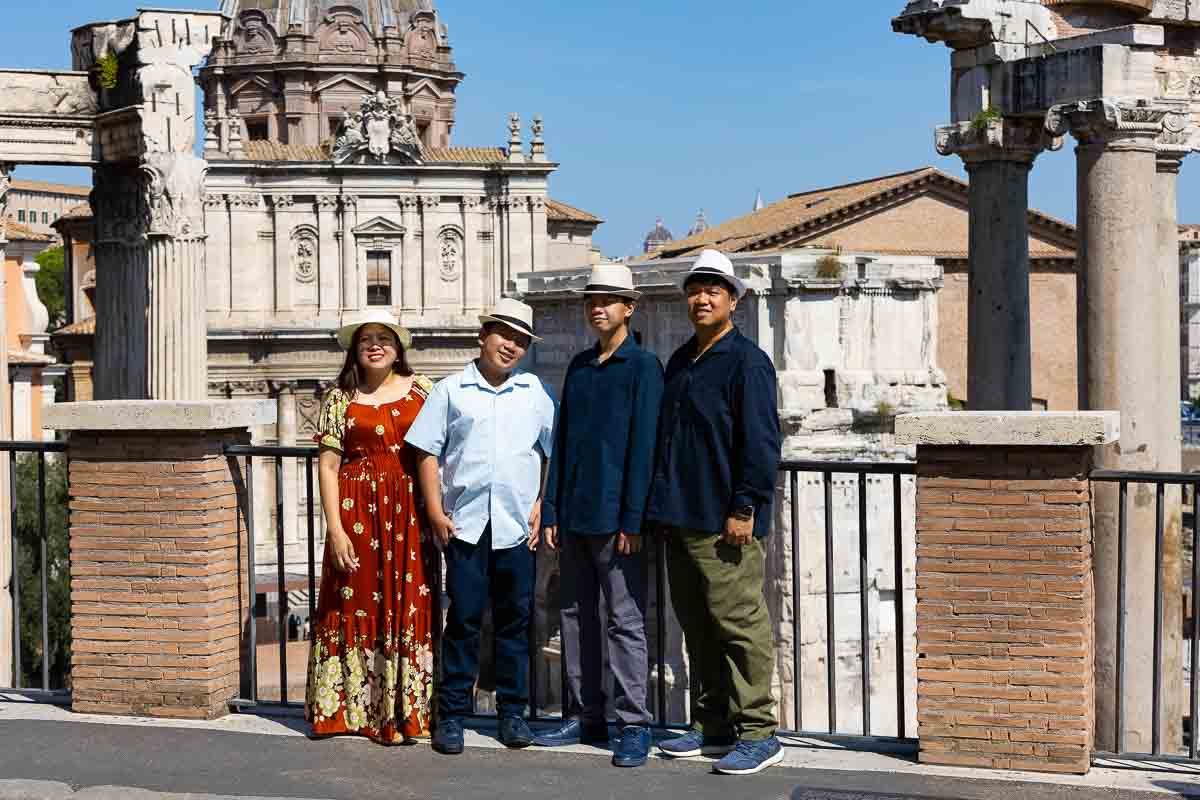 Taking vacation pictures at the Roman Forum while visiting the Ethereal city