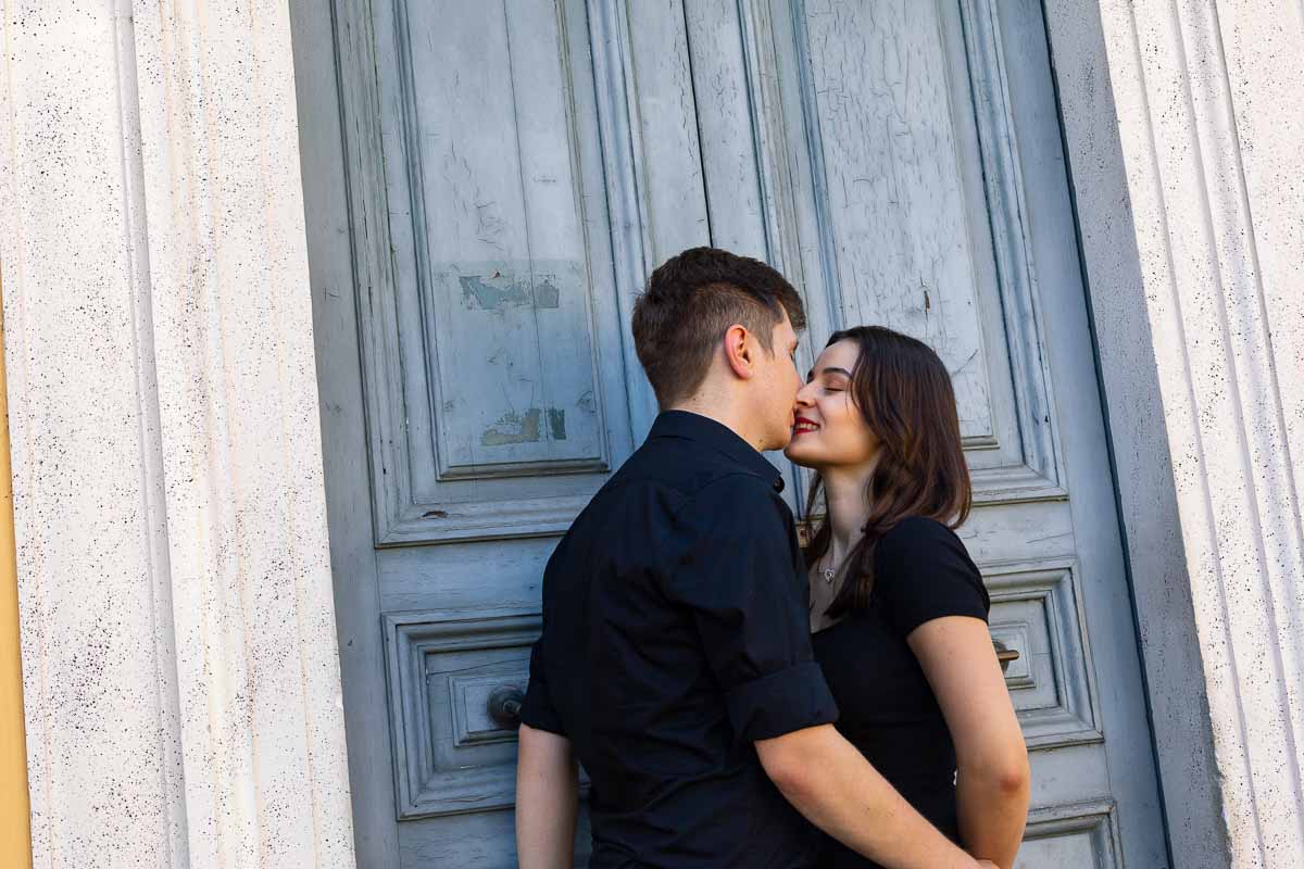 In Love in Rome photo session taken in front of a typical roman door