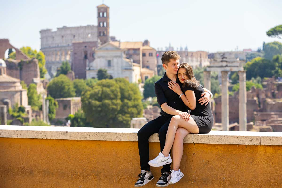 Couple photos taken with the Coliseum seen in the far distance as backdrop