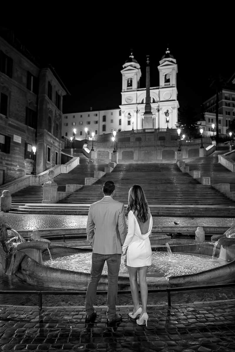 Black and white conversion of a couple looking Spanish steps Italy