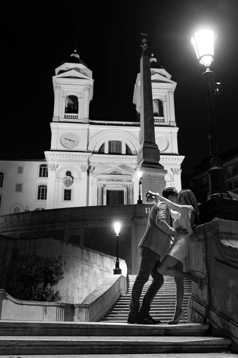 Together in the roman streets taking black and white pictures together with a professional photographer