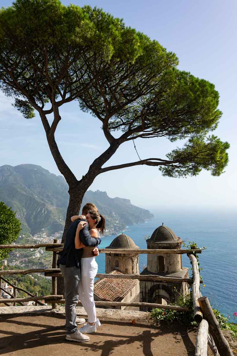 The she said yes moment among scenic views over the coast and ancient domes and mediterranean pine trees
