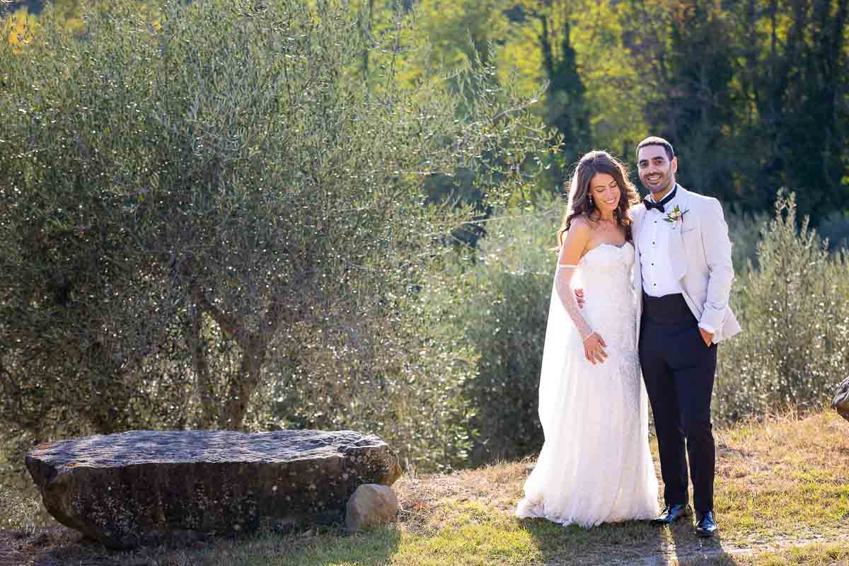 Newlyweds just married taking photos outdoors 