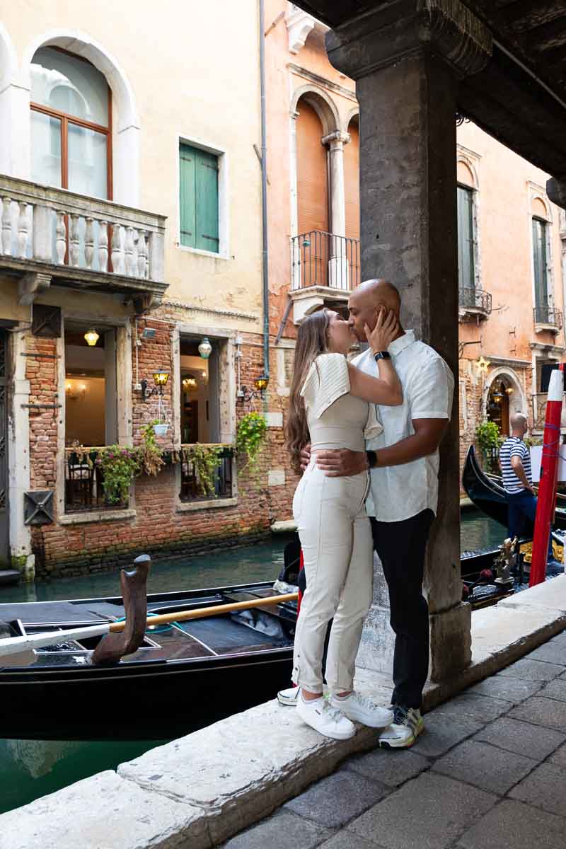 Kissing portrait of just engaged couple