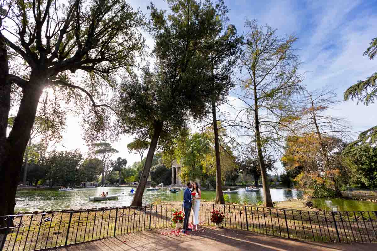 Wide angle view lake used as setting to a beautiful proposing moment
