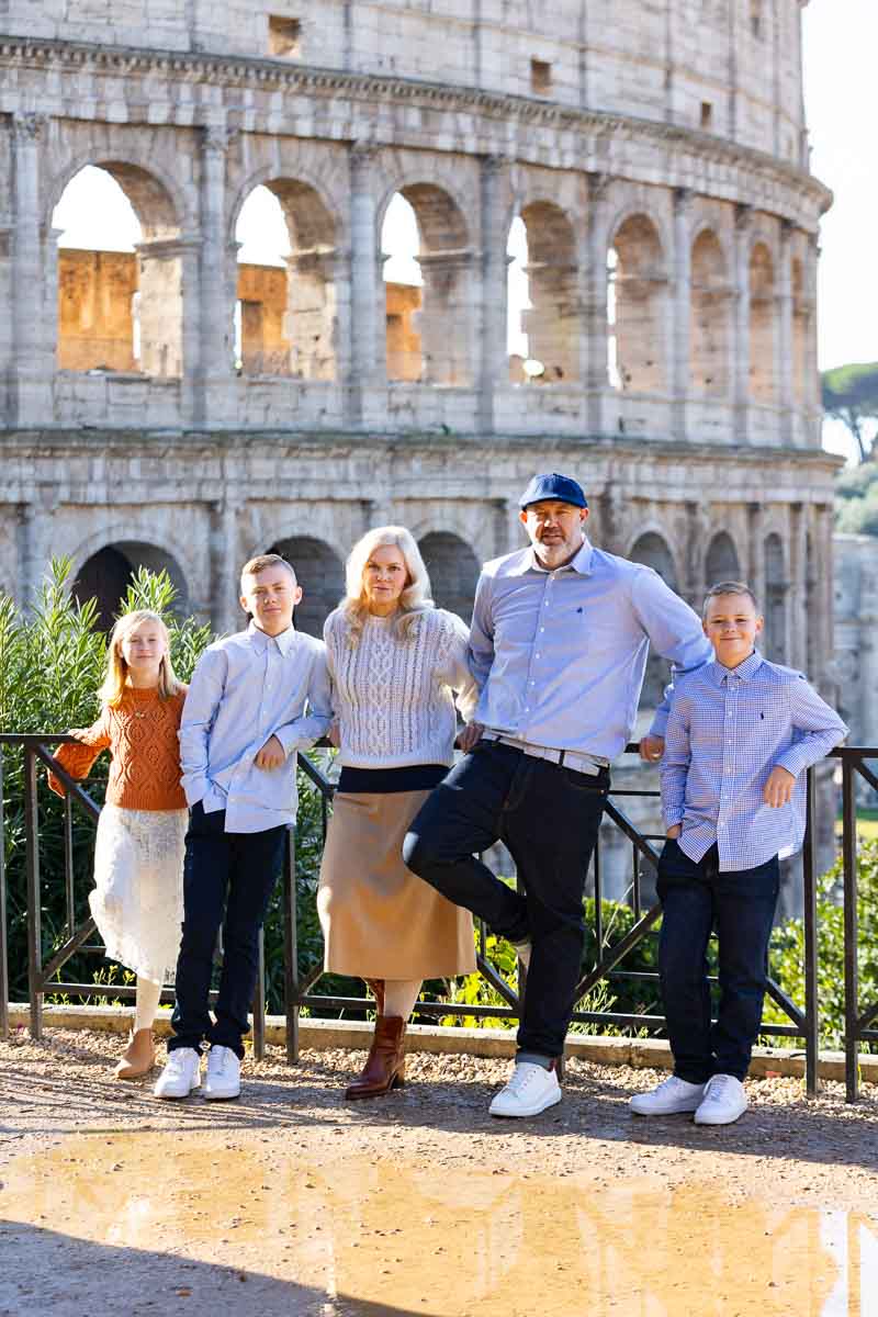 Standing in front of the Colosseum during a professional photo session with a local photographer