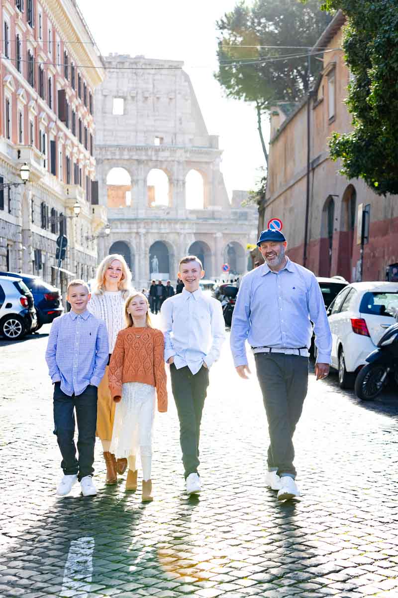 Walking on a cobblestone street in the middle of the street with the view of the major landmark in the background