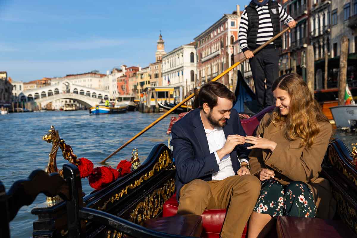 Placing the engagement ring on the finger during a engagement promise 