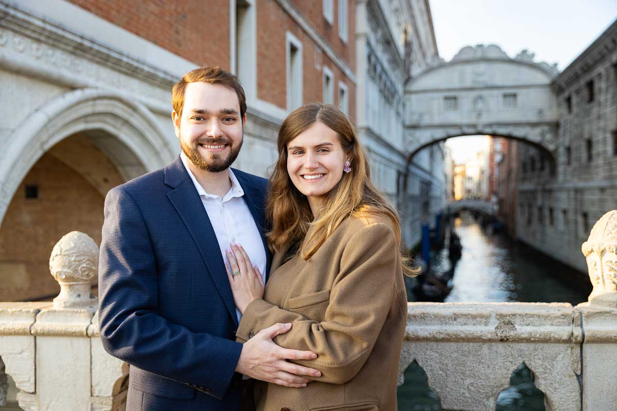 Taking pictures together by the bridge of Sighs portrait photography 