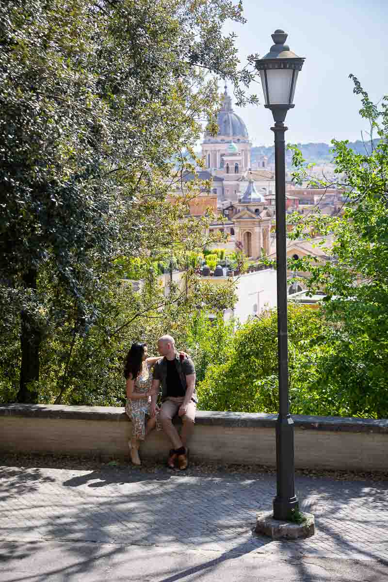Taking pictures in front of the roman scenery in the far distance