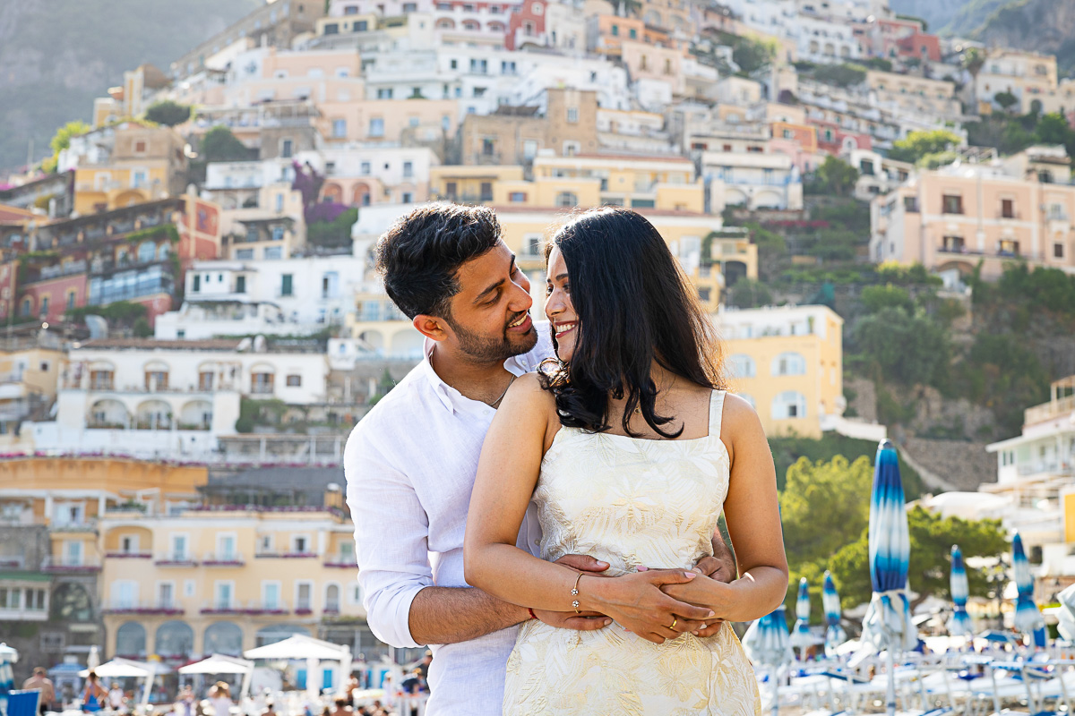 Couple portrait picture snapped in front of the vertical town background
