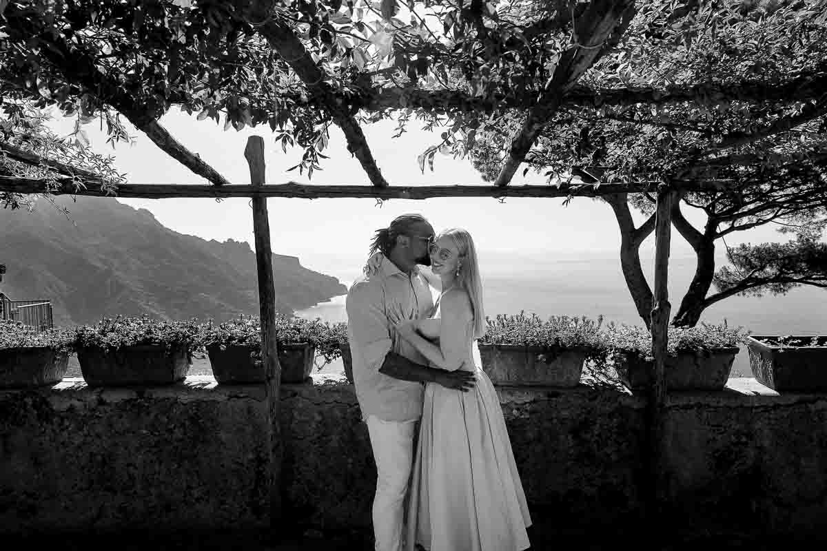 Posed couple before the mediterranean sea