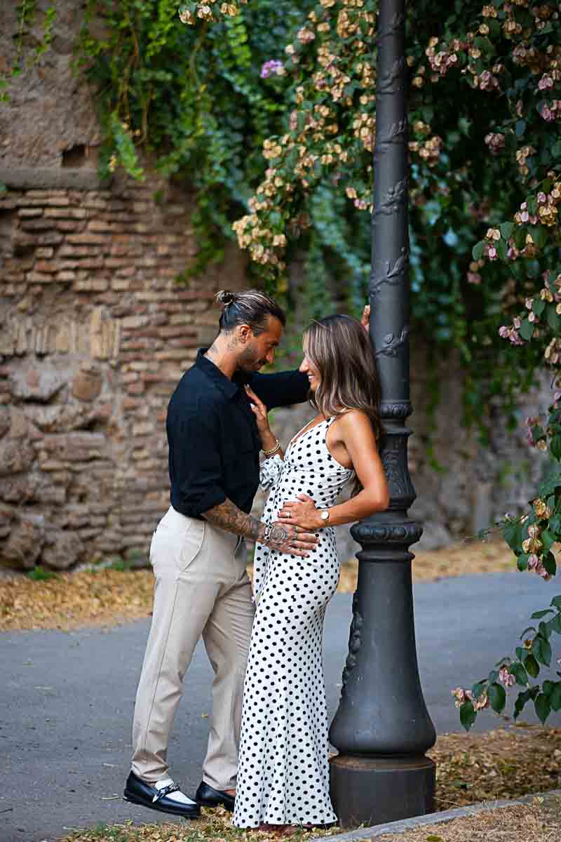 Posed by a light pole during a photoshoot