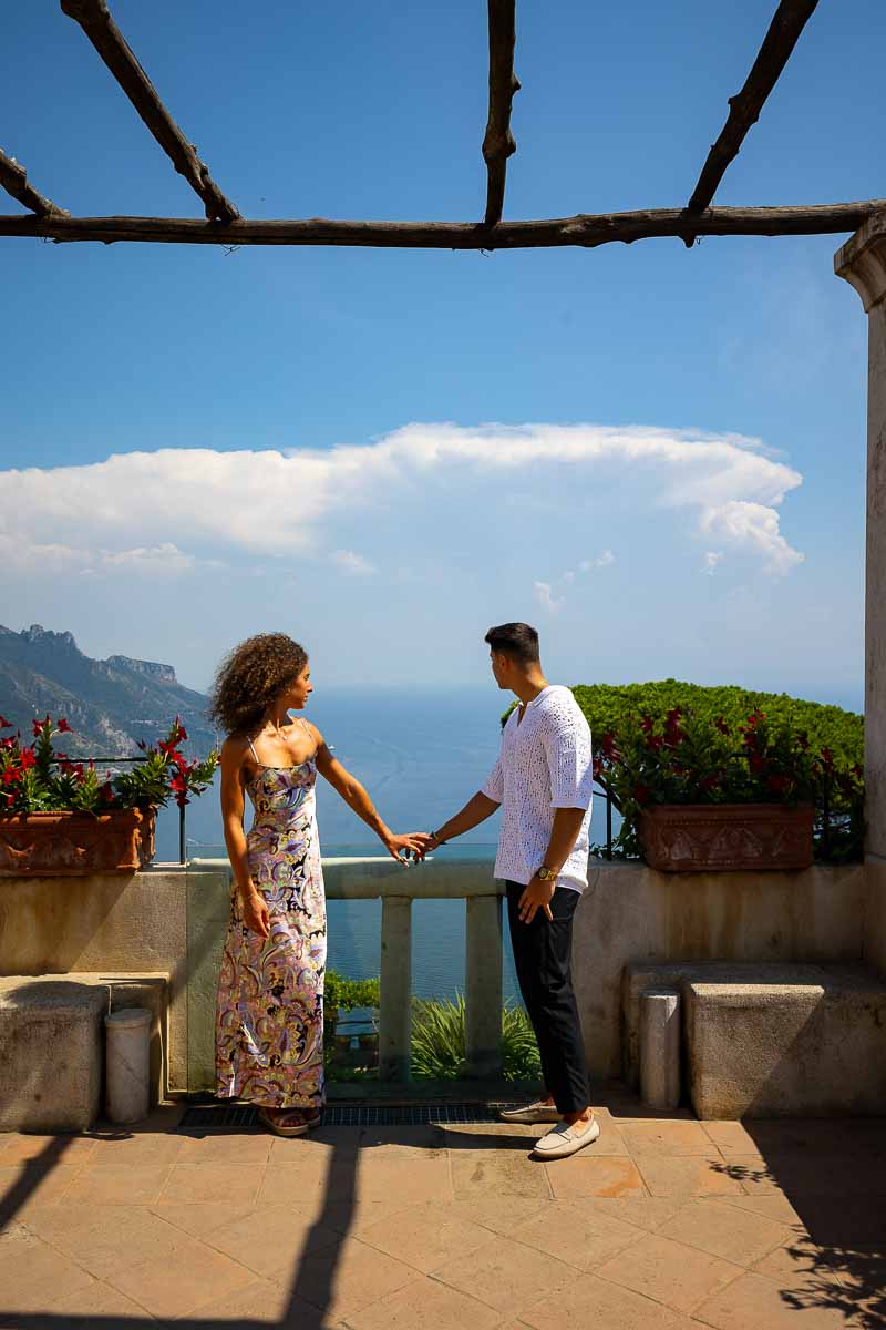 Holding hands and admiring the view over the Italian coast