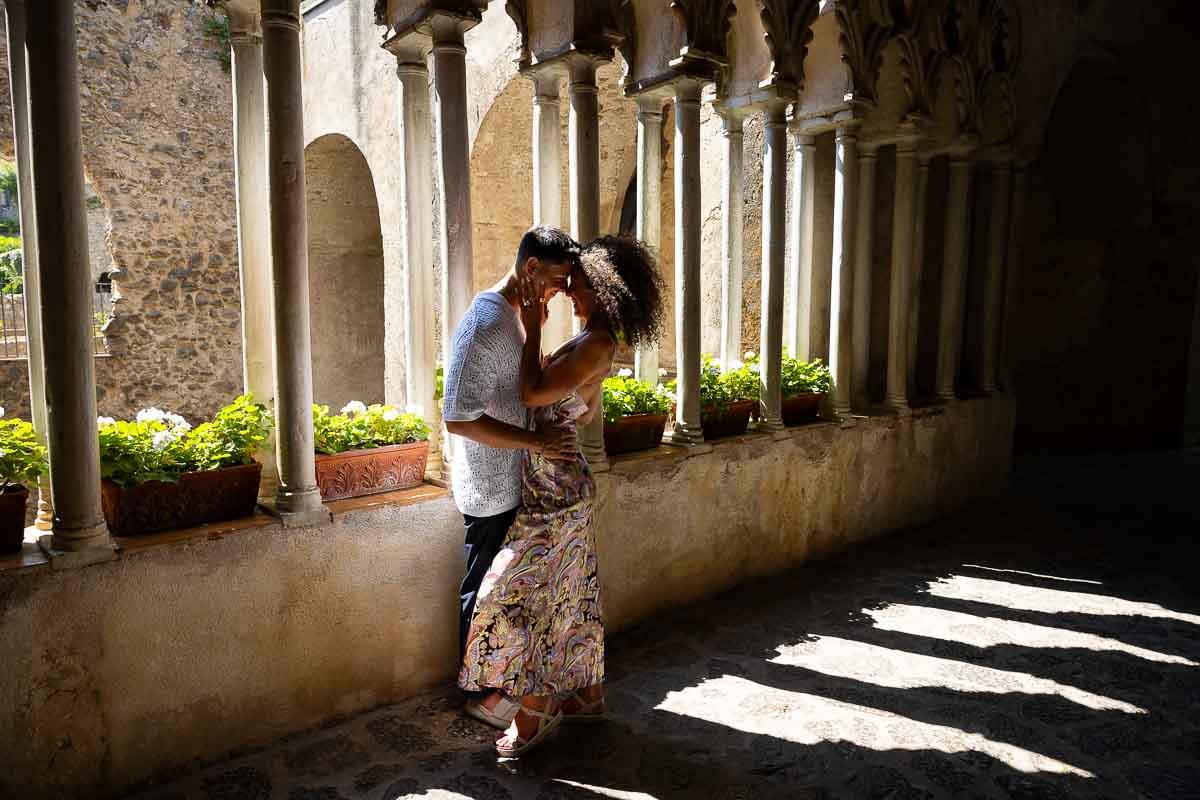 In love during a unique and creative photoshoot under columns and shadow photography