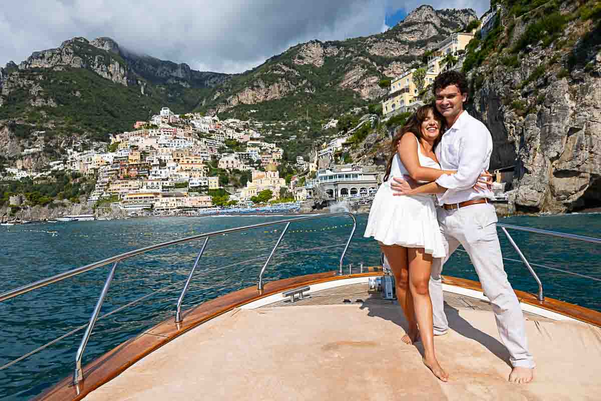 Just engaged on a boat after a surprise promise candidly photographed on a private ship