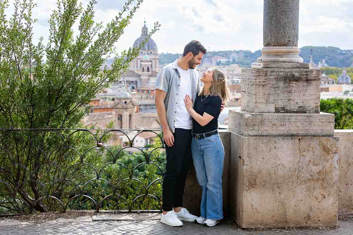 Standing together terrace which overlooks the panoramic view of the roman skyline