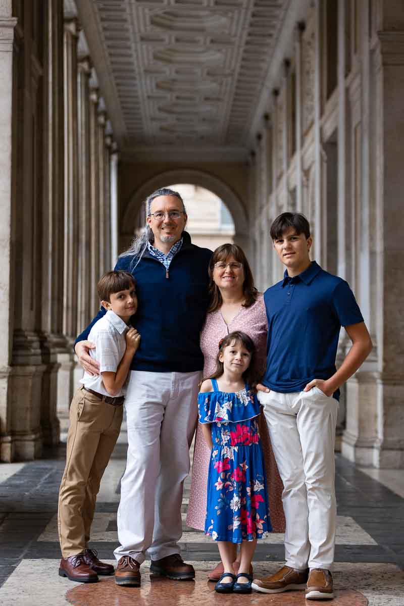 Vertical portrait posing underneath a colonnade Italy