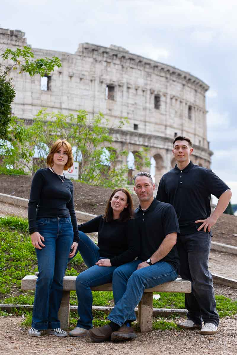 Sitting down portrait picture before the Roman Colosseum