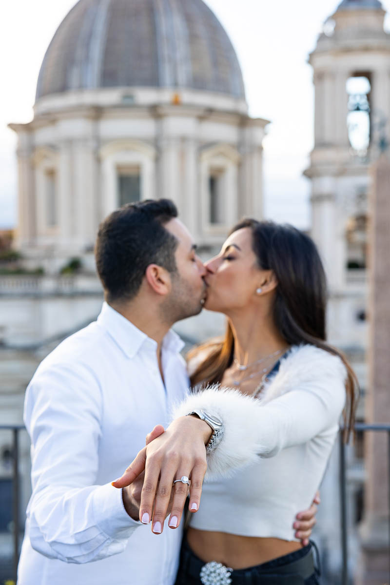 Taking engagement pictures together after asking the big question 