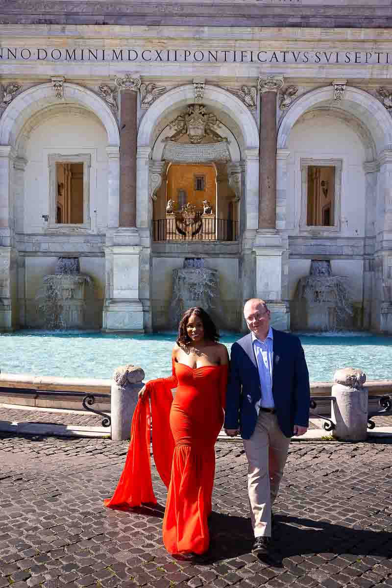 Walking hand in hand during a pregnancy photography session Italy with a professional photographer