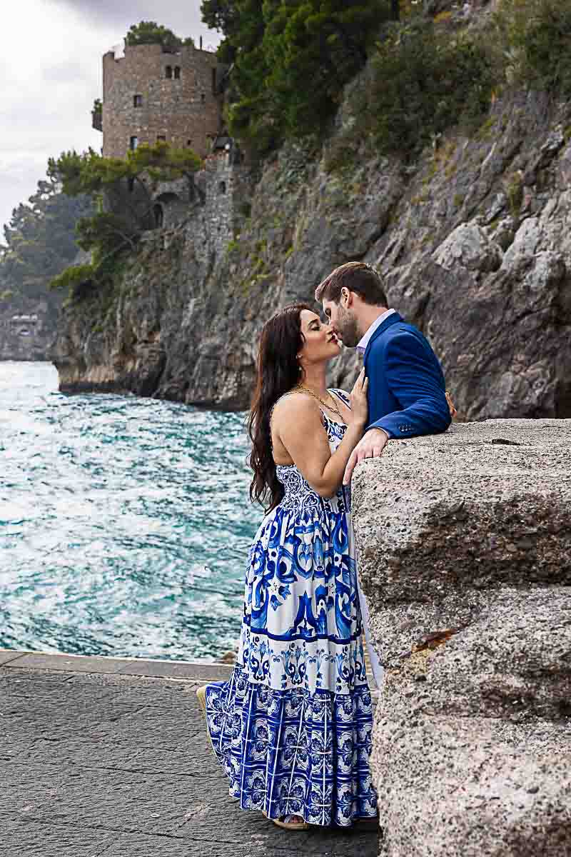 Intimate photography photoshoot of them kissing while being together on a Positano Couples Photoshoot to celebrate engagement honeymoon