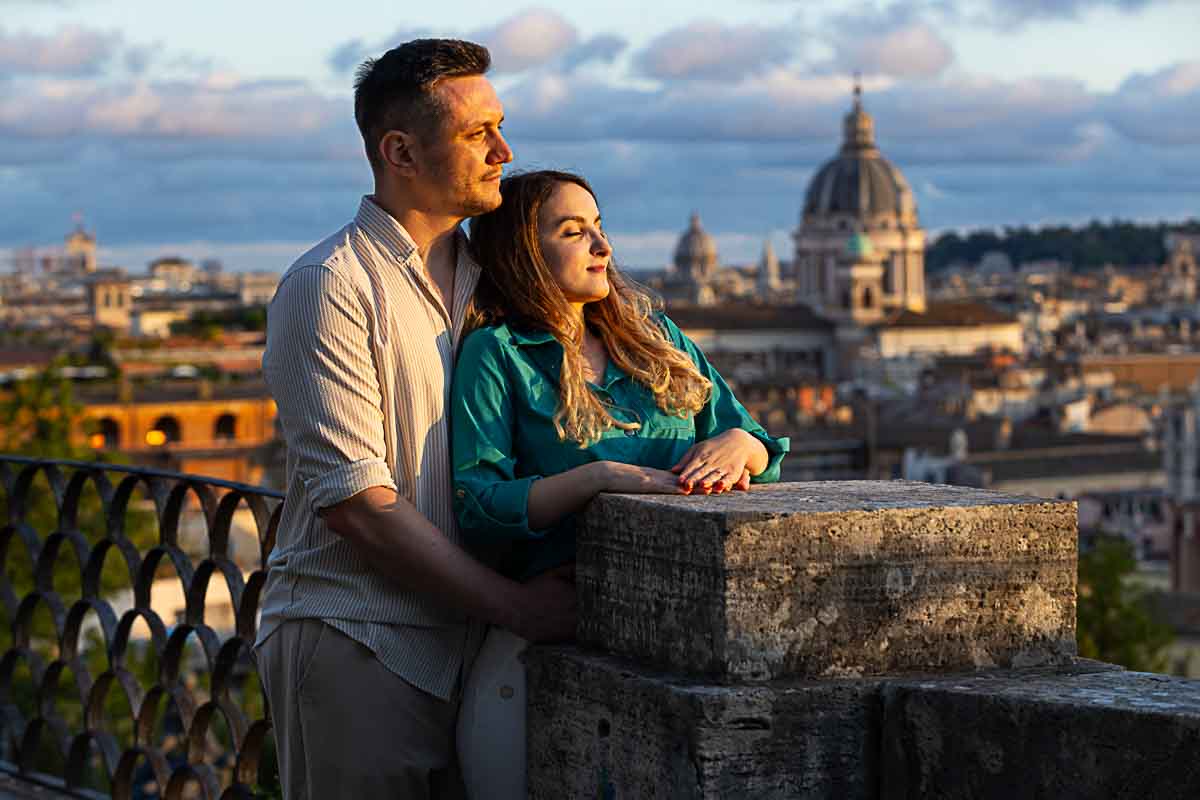 Sunset pictures taken at the Pincio terrace outlook in Rome Italy after a surprise wedding marriage proposal 