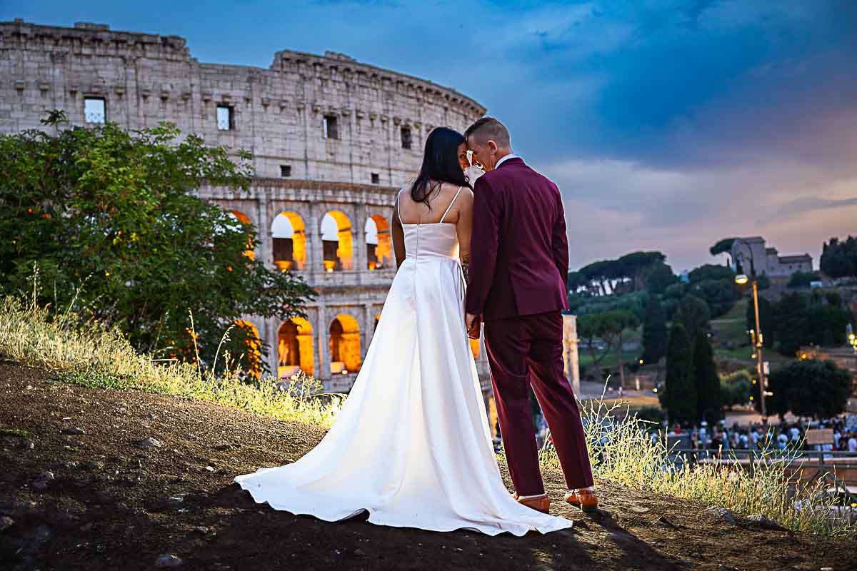 Stunning pictures during the blue hour in Rome during a wedding photoshoot as night started to fall at the Colosseum