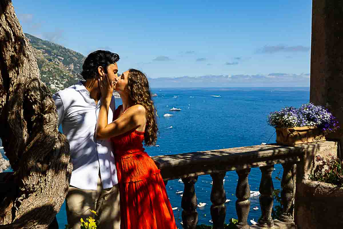 Final kiss captured in stunning photography, set against the breathtaking coastal backdrop at sunset. Positano Proposal Photographer session