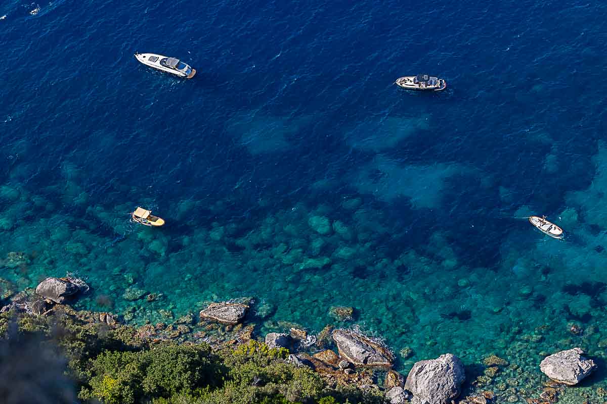 The view of the tyrrhenian sea from the above property with the emerald green blueish water beach in Capri amazing coast