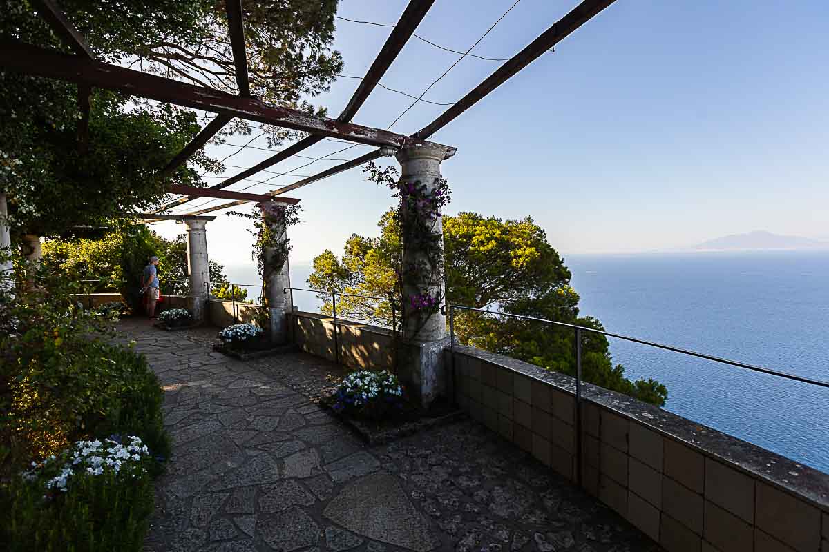 The terrace portico of the villa with the stunning view of the horizon and seascape used as venue for a Romantic Capri engagement shoot