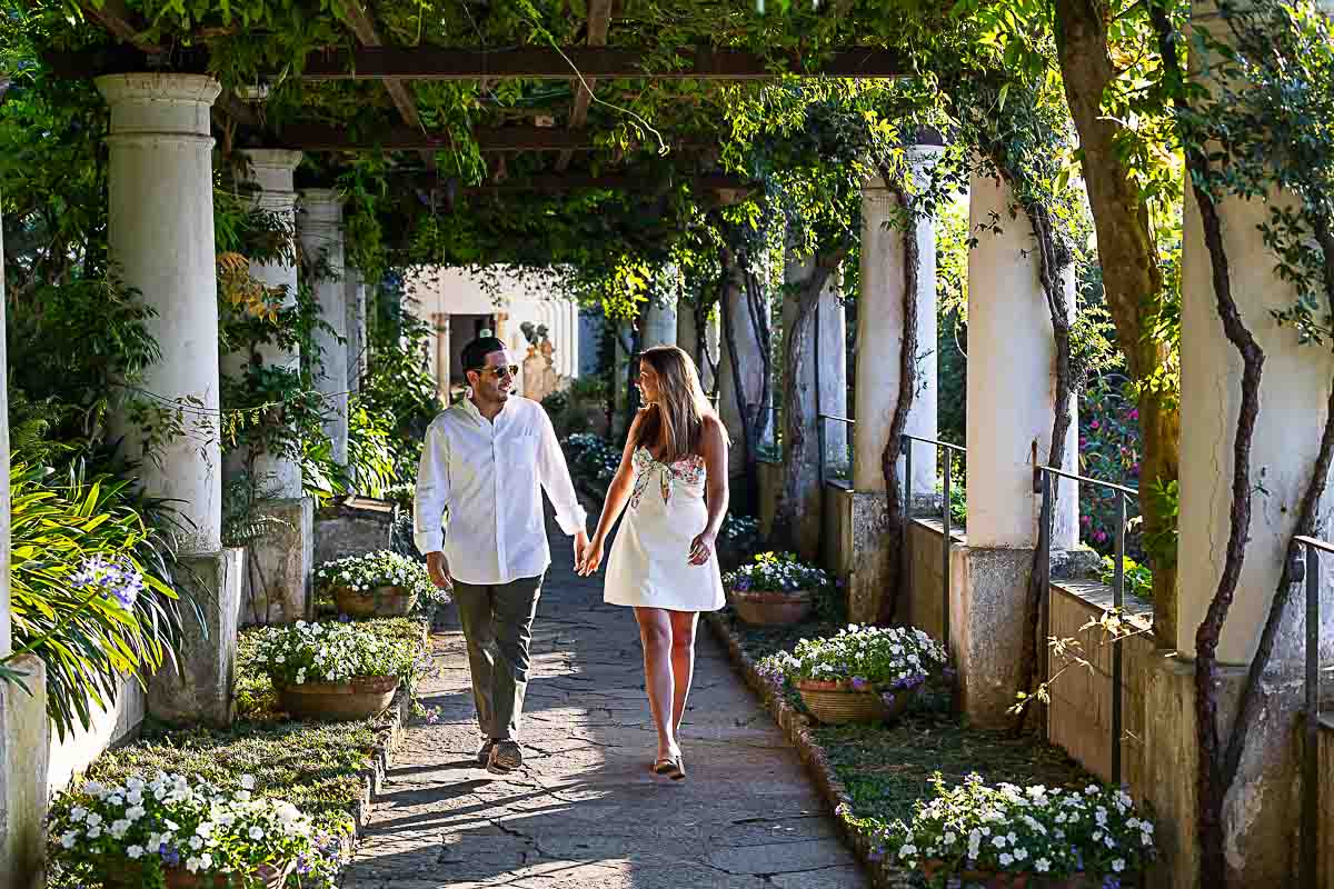 Walking next to one another during a photography session during a S. Michele villa photographer session