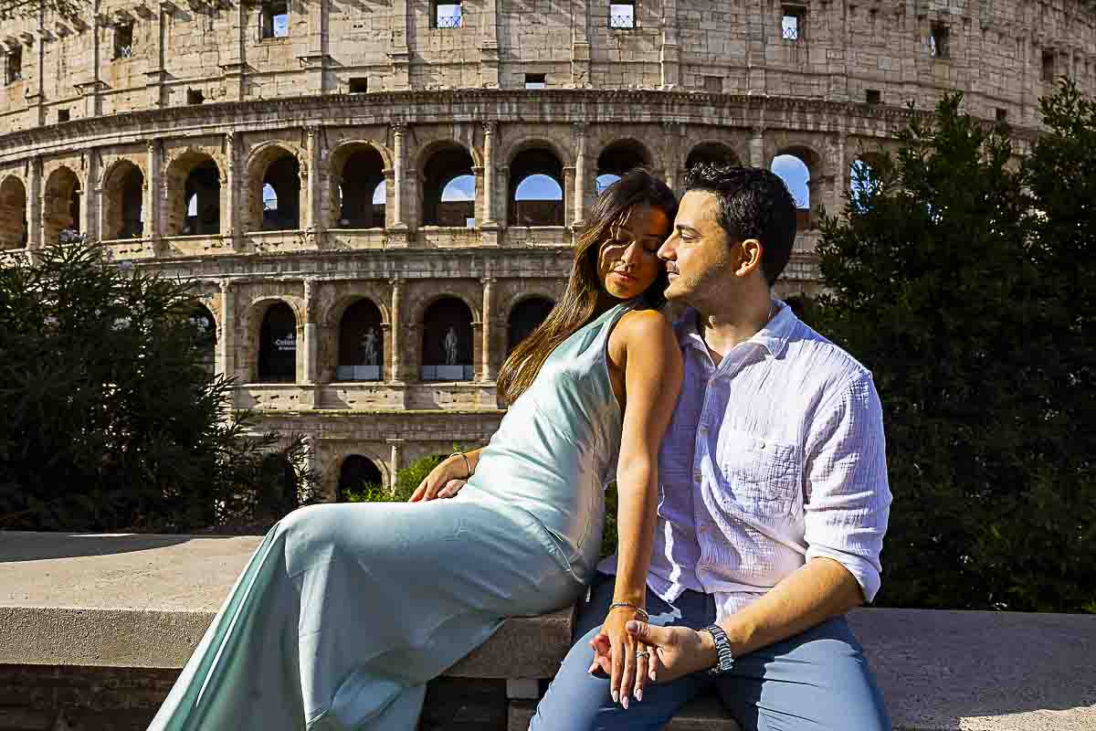 Leaning on one another during a Rome photoshoot session by the Colosseum