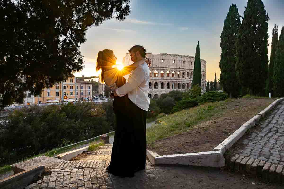 silhouette imagery at sunset during a proposal photoshoot roman Colosseum