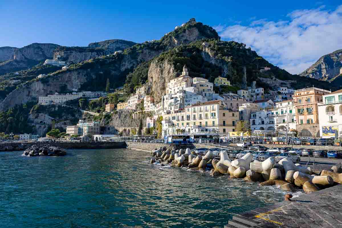 A town view of Amalfi with buildings and the waterfront seascape and landscape photography