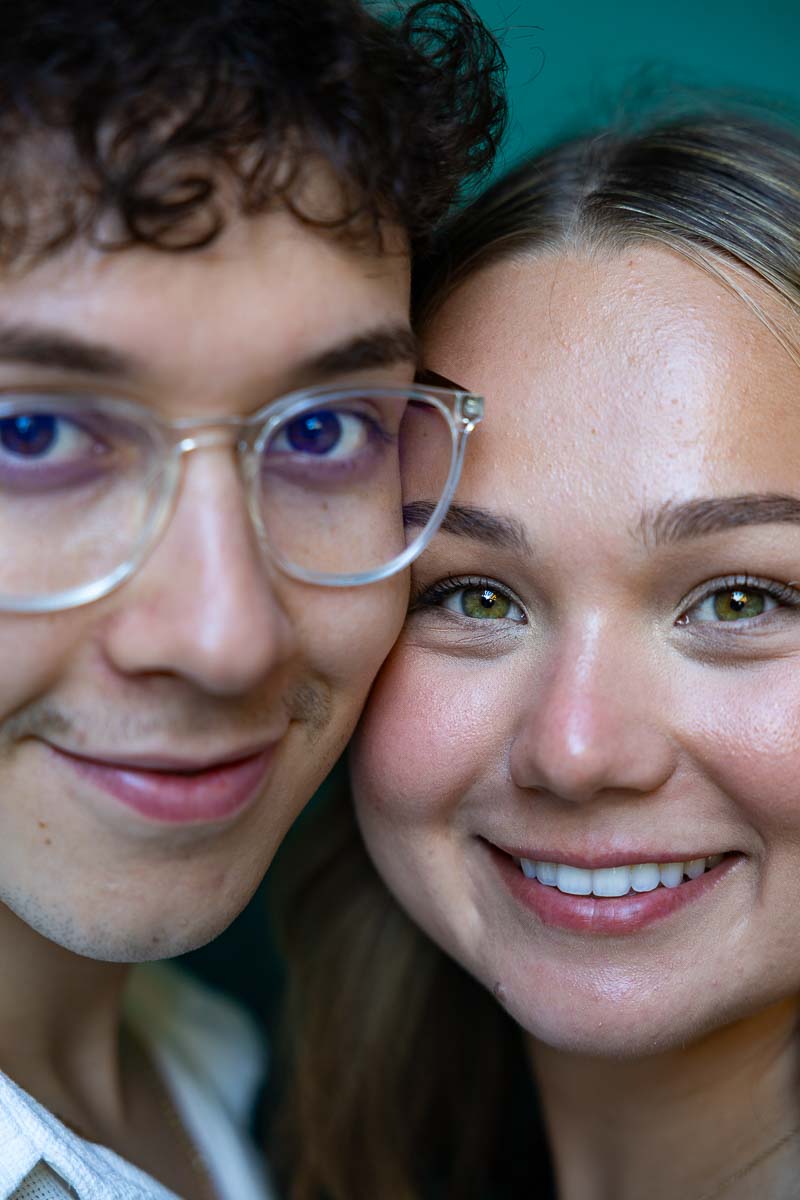 Facial closeup photo of newly engaged couple while taking their photos after he proposed in Italy