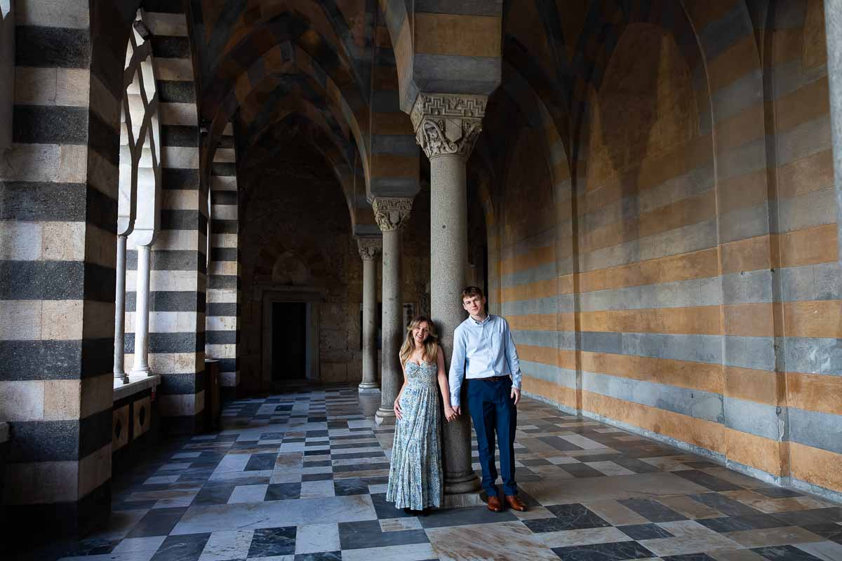 Standing next to a column posing for the camera picture frame