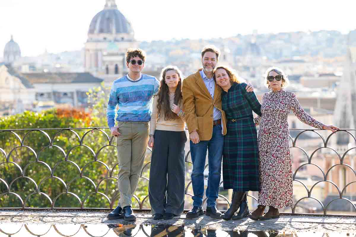 Familiar group shot taken Pincio park terrace that overlooks the beautiful city of Rome from above. Image taken during a photoshoot session