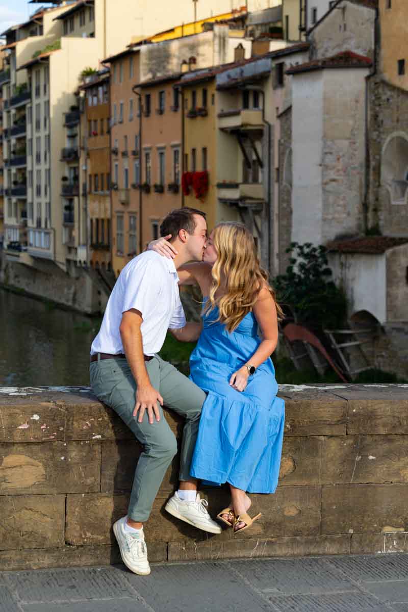 Engagement photos taken of a couple in love and kissing