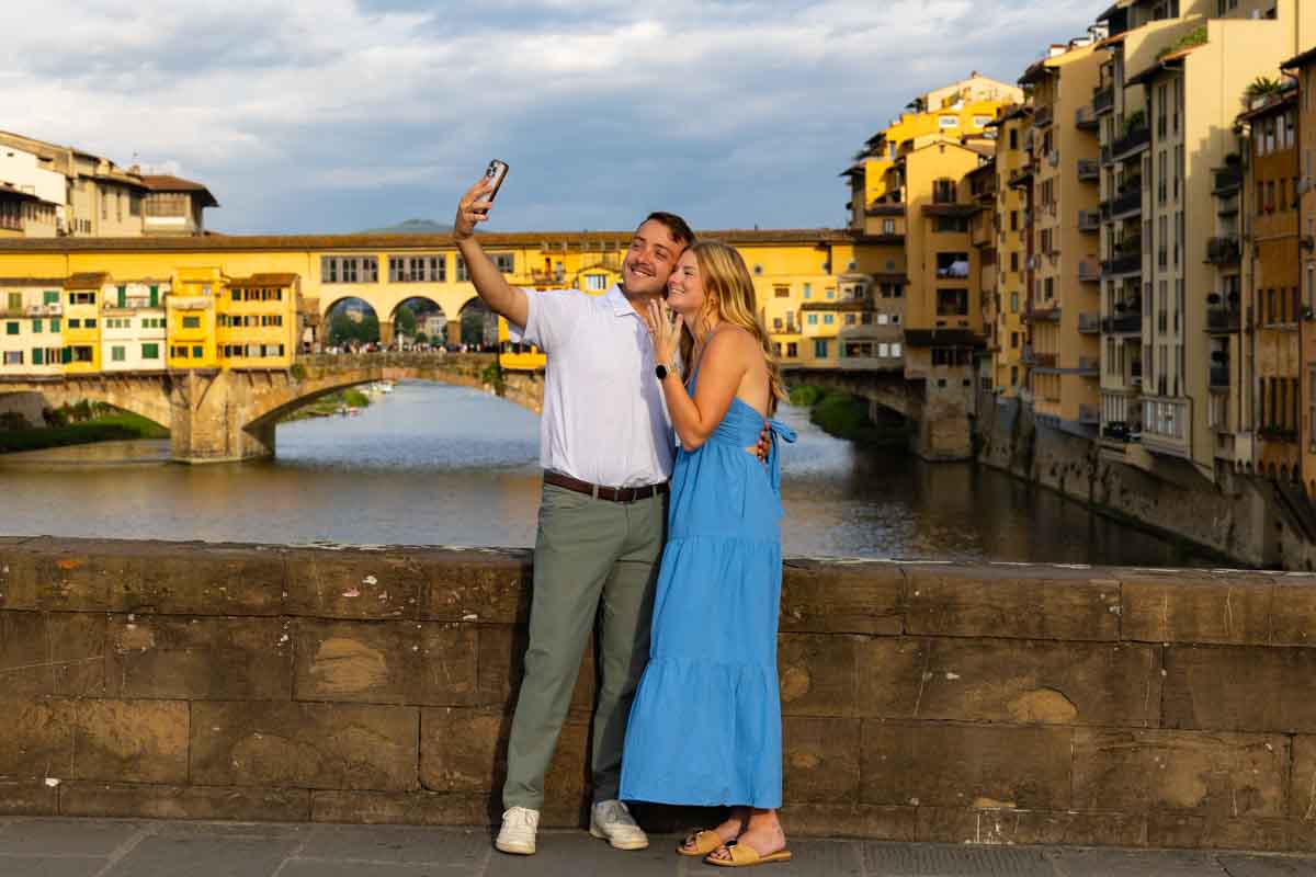 Taking a selfie after having been proposed to together during a photoshoot in Florence