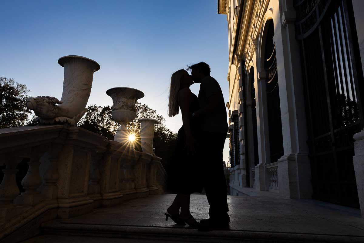 Silhouette pictures shot against the blue sky among classical Italian architecture 