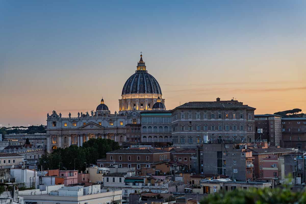 Saint Peter's basilica dome photographed professionally by a cityscape photographer at dusk
