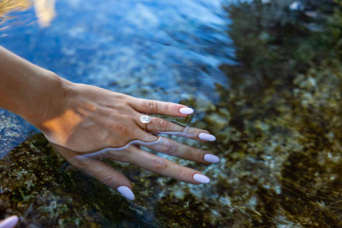 Picture of the engagement ring while being immersed in transparent clear water 