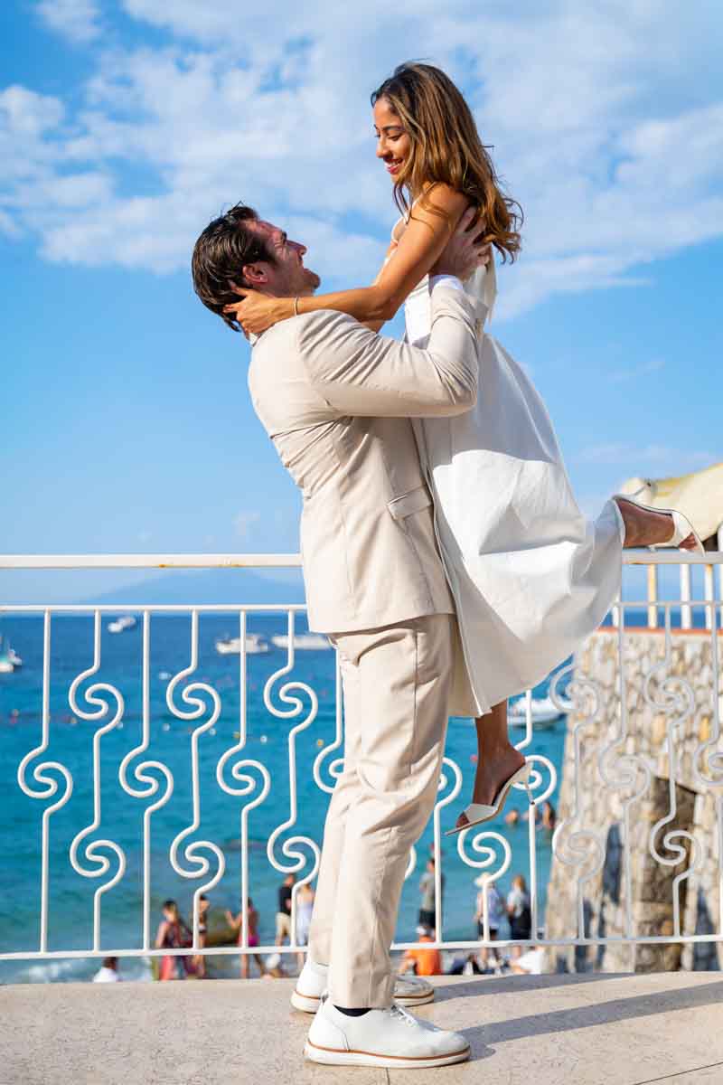 Pick me up pose taken as he lifts her up in the sky